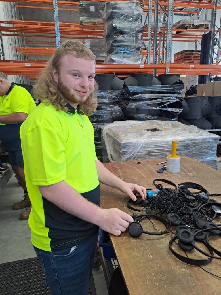 Damian gaining hands-on experience during his first work experience through youth employment services at Help’s Supply Chain in Ipswich.
